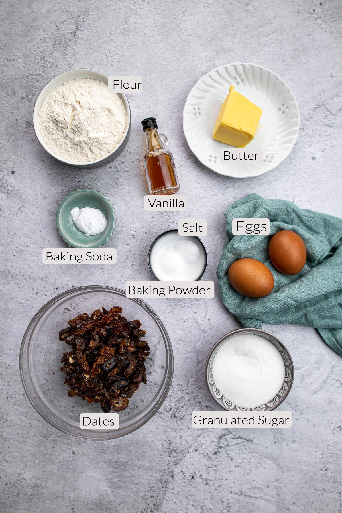 Tipsy Tart Ingredients - flour, vanilla, butter, eggs, baking soda, baking powder, salt, dates, eggs and white granulated sugar.