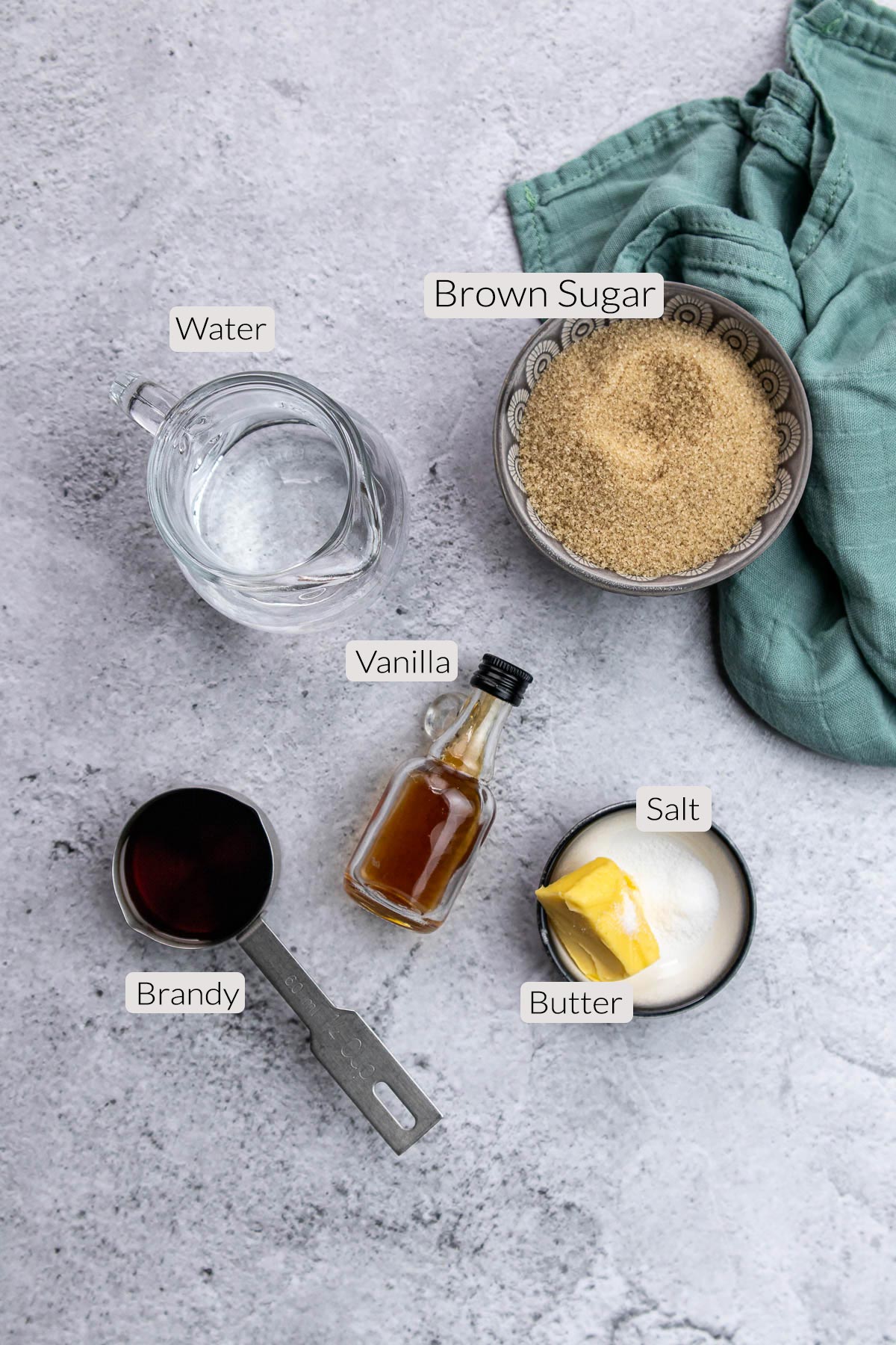 Tipsy Tart Sauce Ingredients - Brown sugar, water, brandy, vanilla, butter, salt.