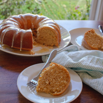 Slice of Rooibos Tea Cake in front of the bundt
