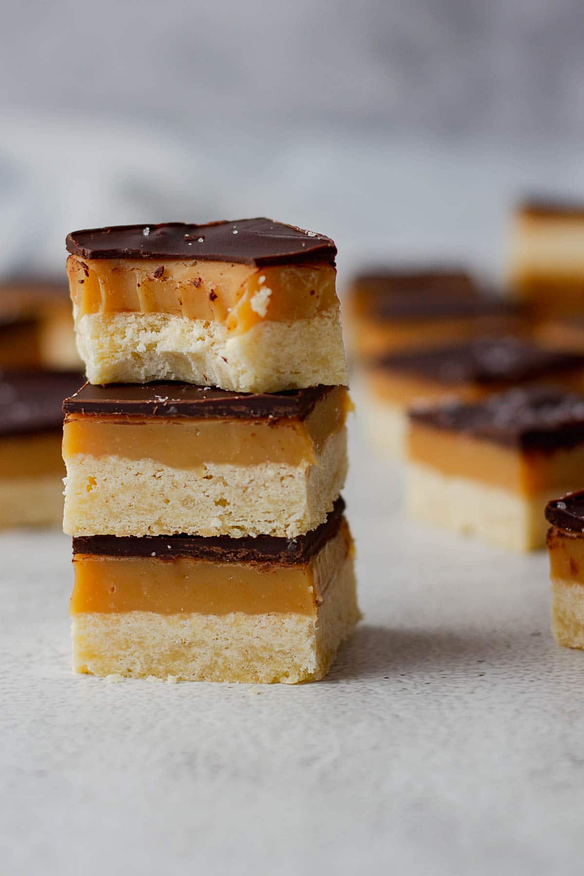 Salted Caramel Slice (Millionaire's Shortbead) stacked on each other