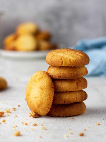 Condensed milk biscuits stacked on each other.