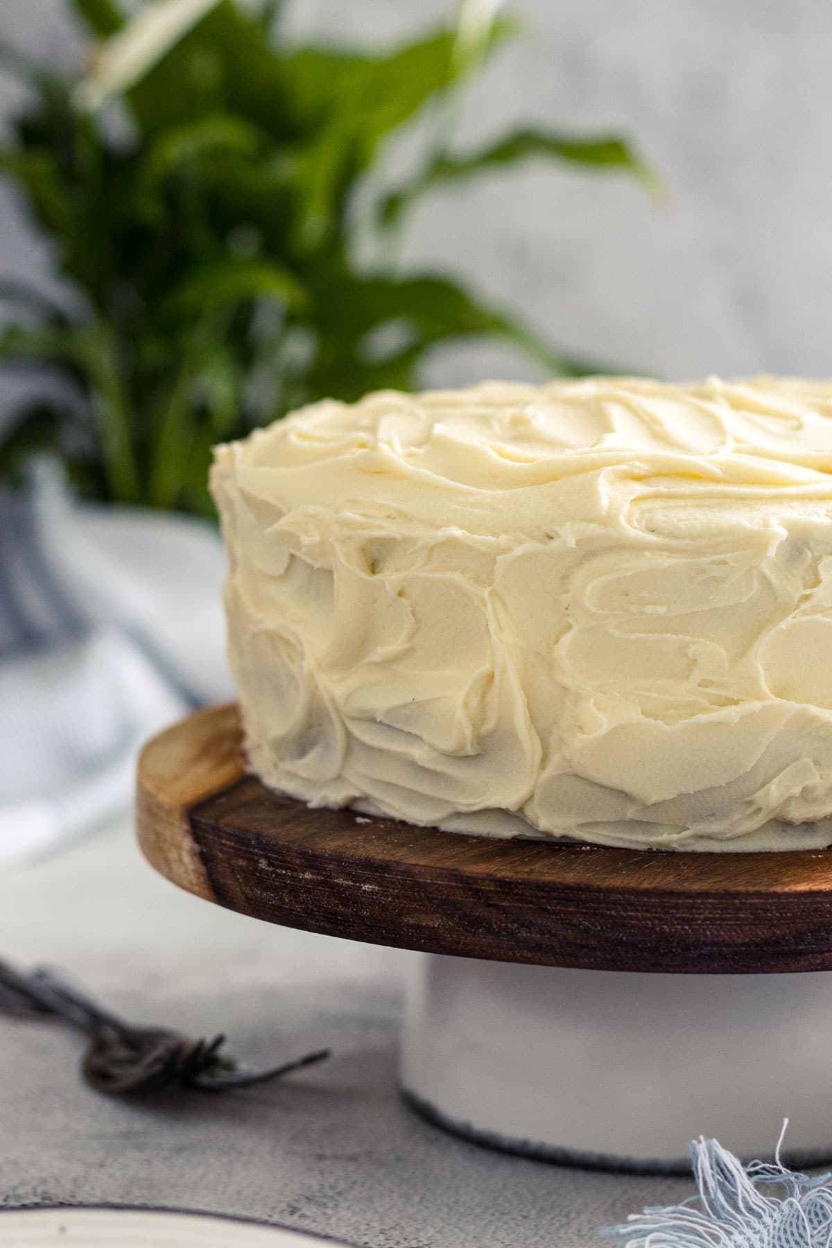 Carrot cake with rustic cream cheese icing/frosting.