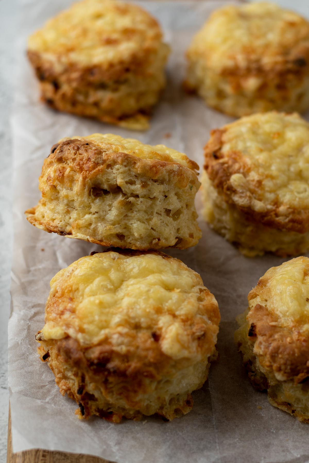 Close up of a cheese and onion scone showing layers.