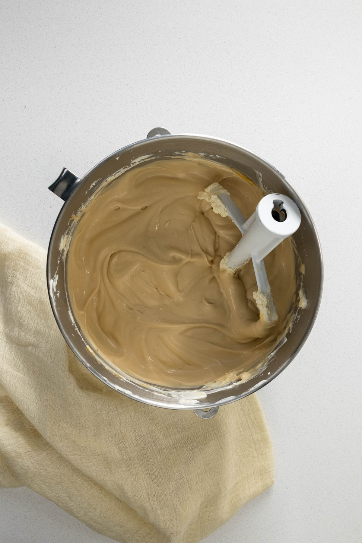 Step 9 - Biscoff cheesecake filling in a mixing bowl.