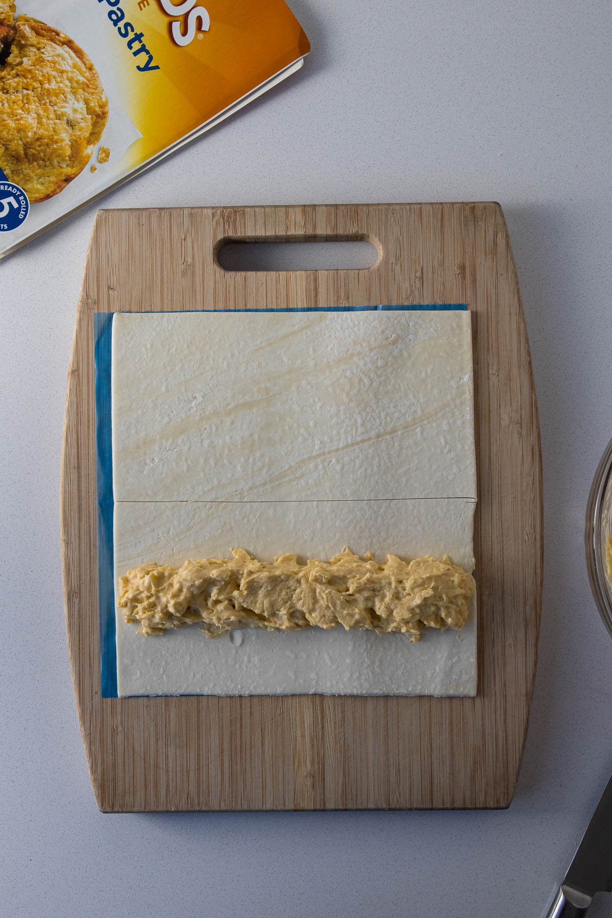 Cheese filling placed on the puff pastry.