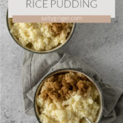 Vanilla rice pudding in bowls topped with ground cinnamon.