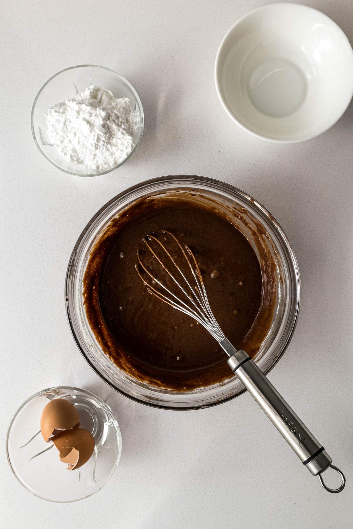 Chocolate loaf cake batter in a bowl.