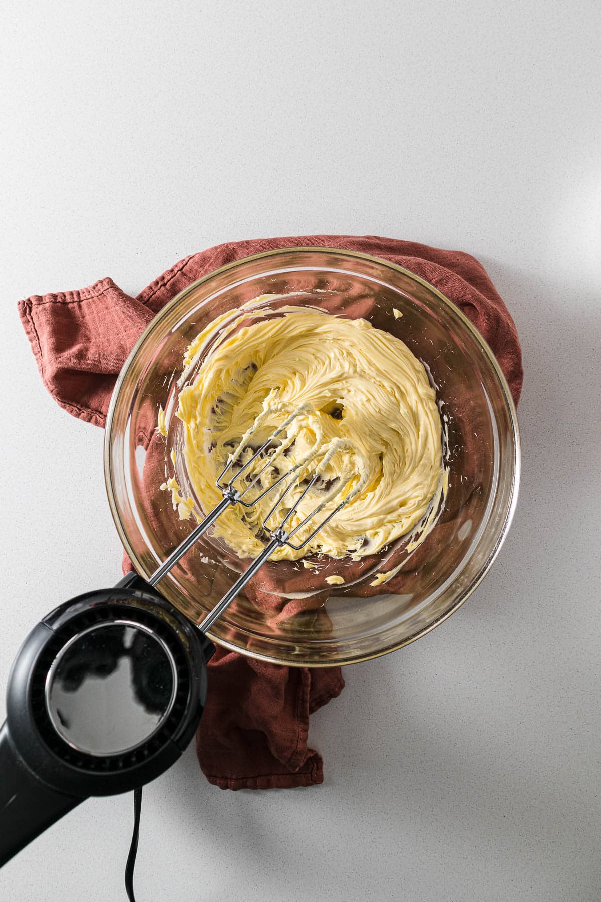 Creamed butter in a mixing bowl.