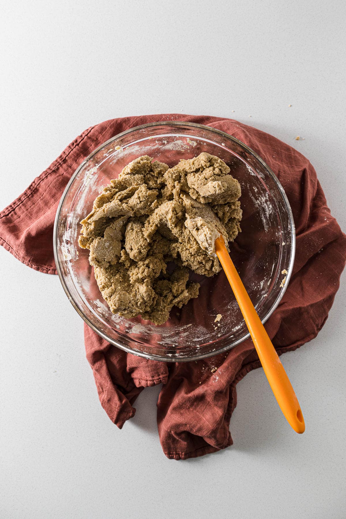 Ginger biscuit dough in a mixing bowl.
