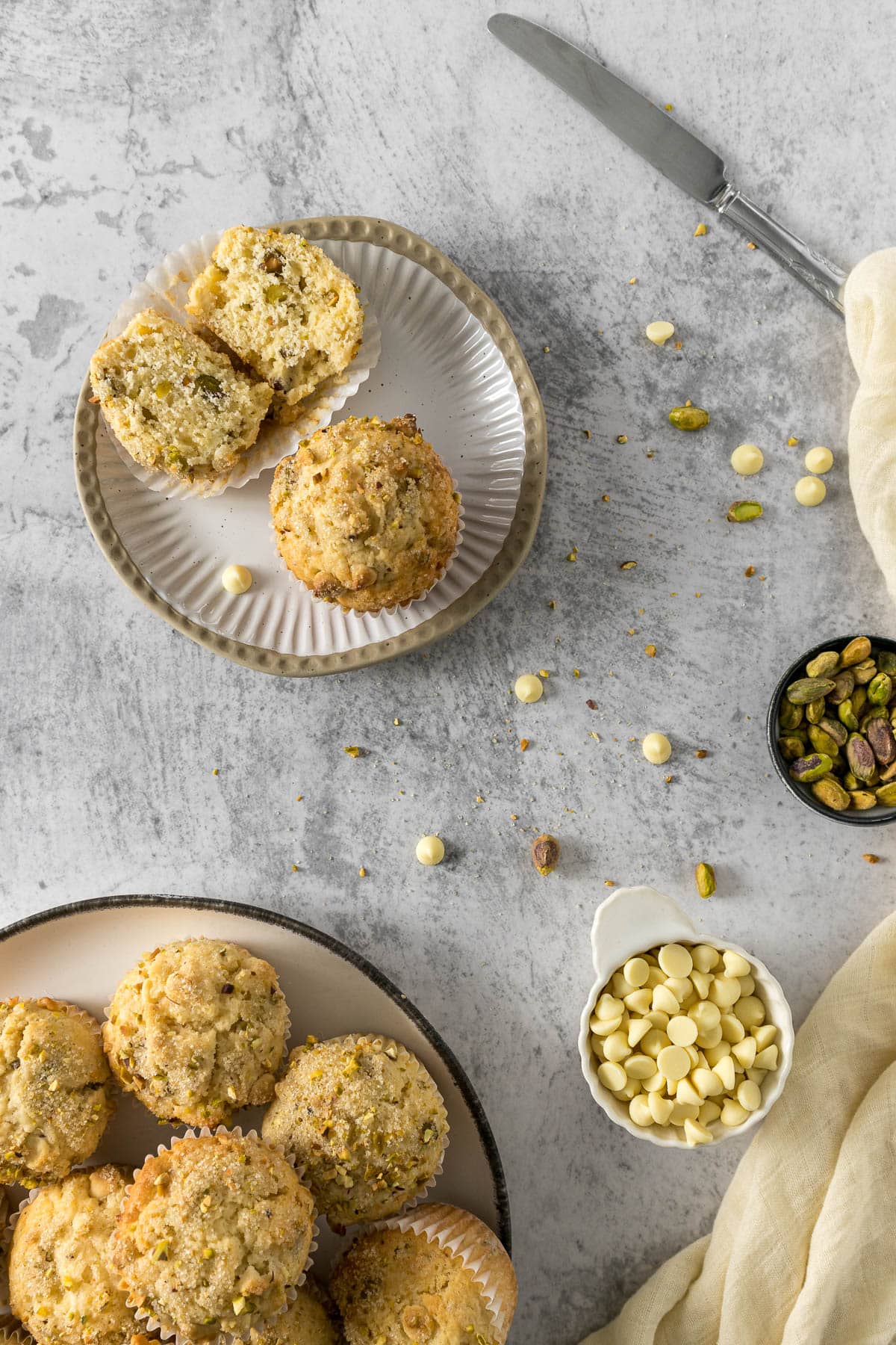 Pistachio muffins on a plate.