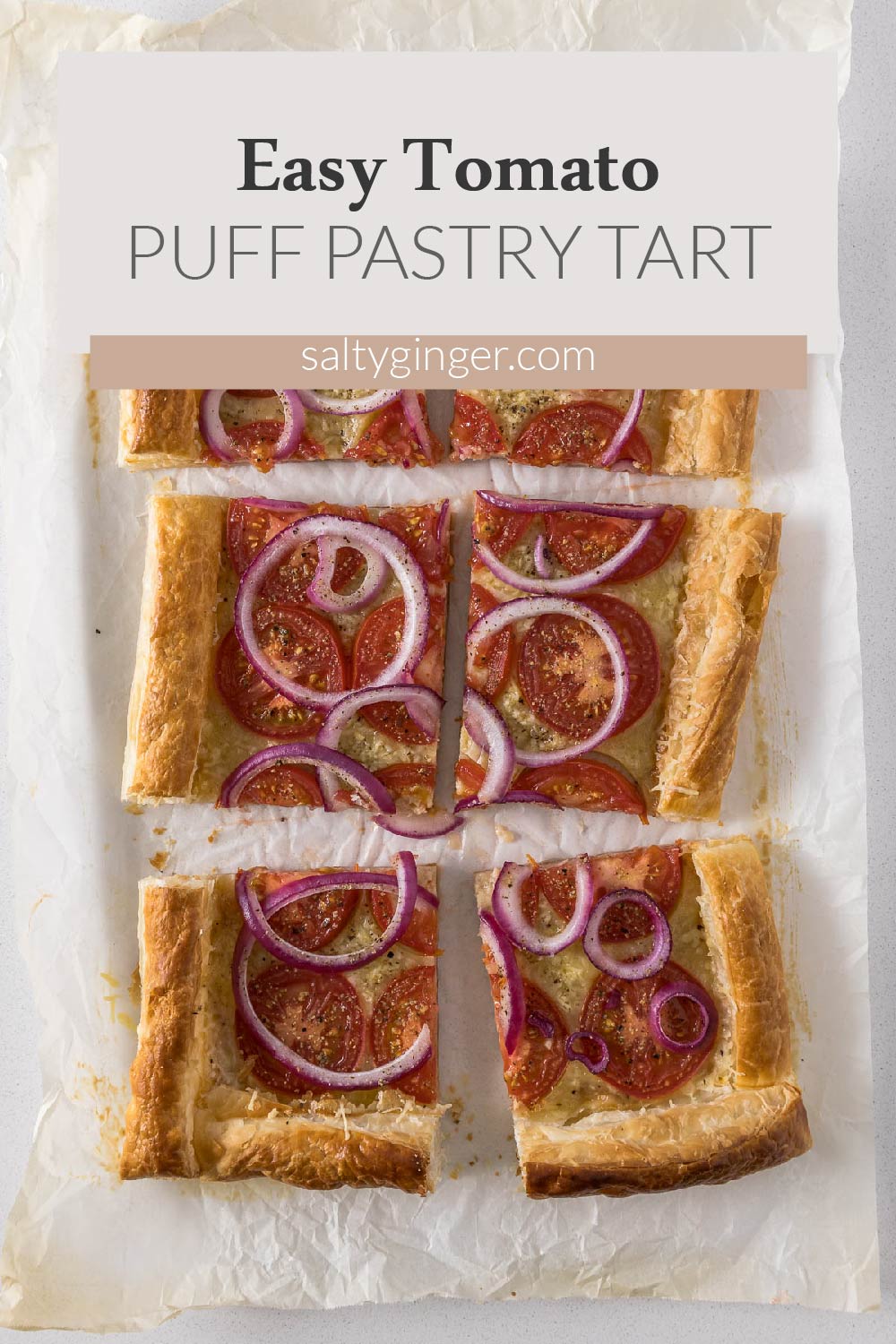 Baked and sliced tomato puff pastry tart.