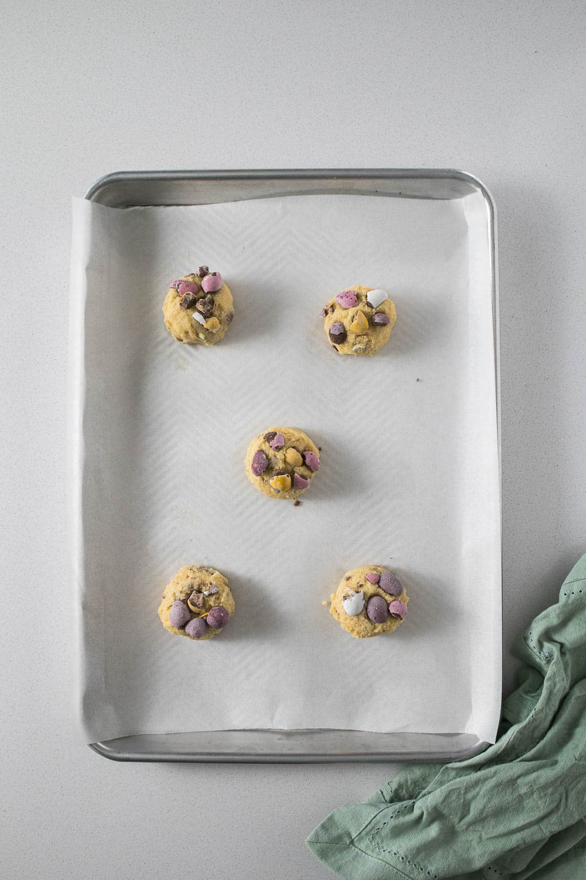 Step 8 - portioned cookies topped with mini eggs.