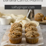 Pin - Banana carrot muffins on a serving board.