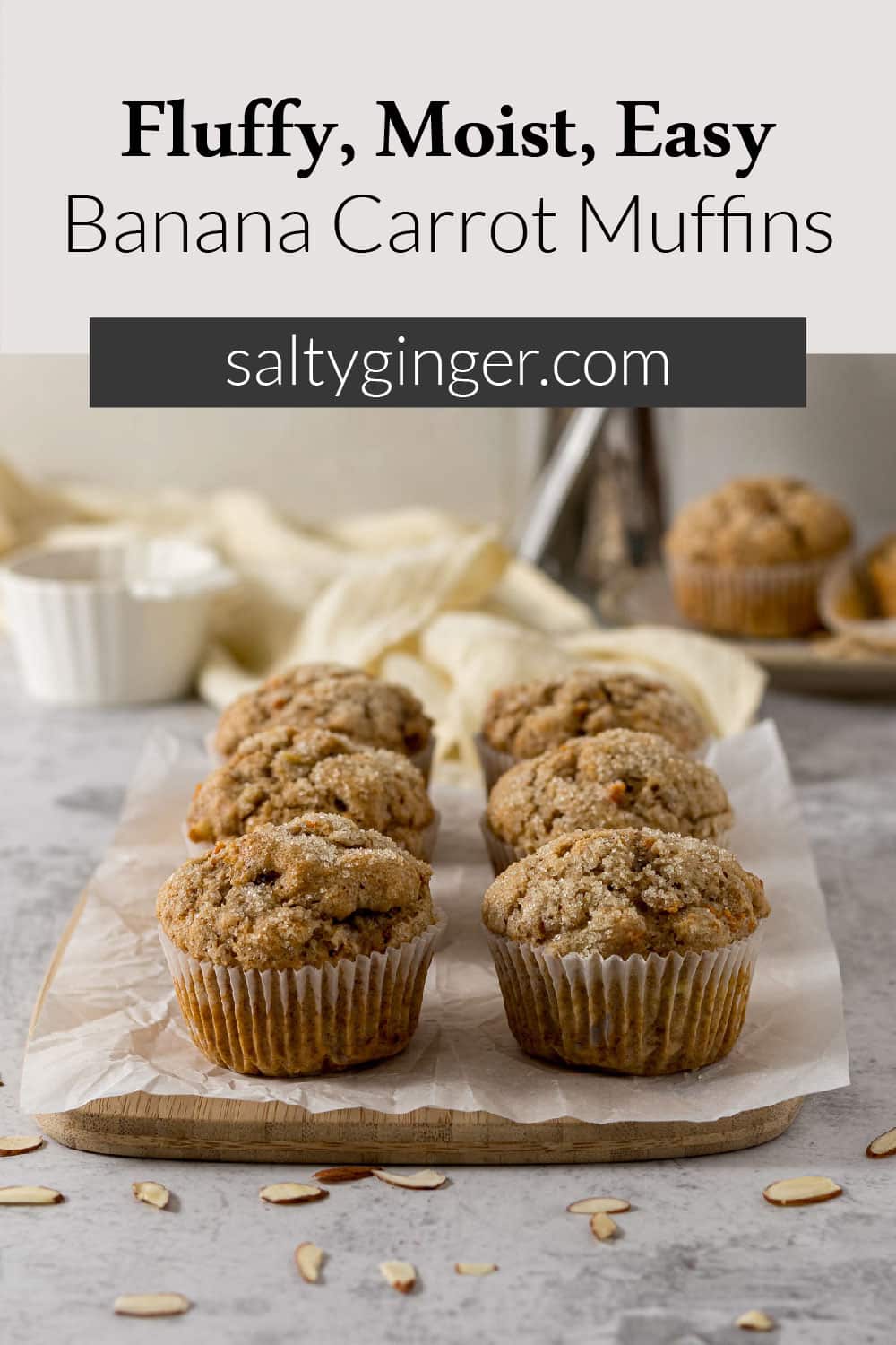 Pin - Banana carrot muffins on a serving board.