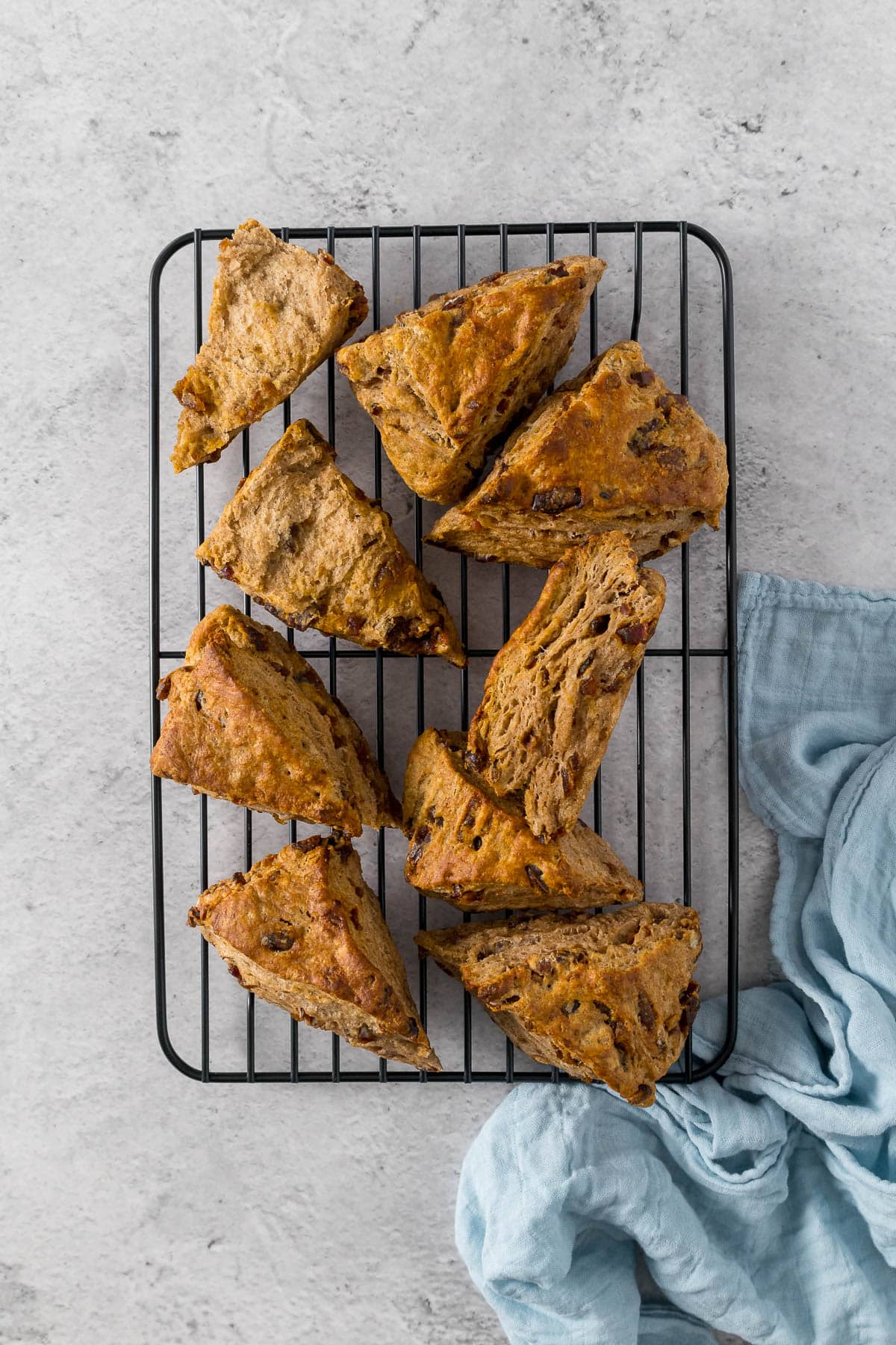 Date scones on a cooling rack.