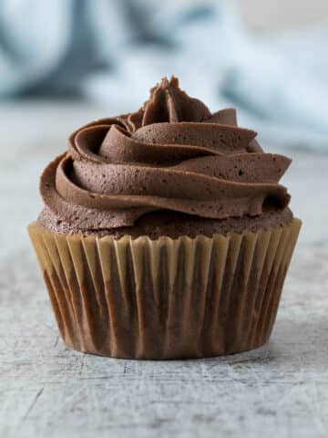 Chocolate cupcake with a chocolate buttercream swirl.