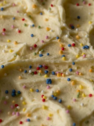 Whipped buttercream frosting with sprinkles.