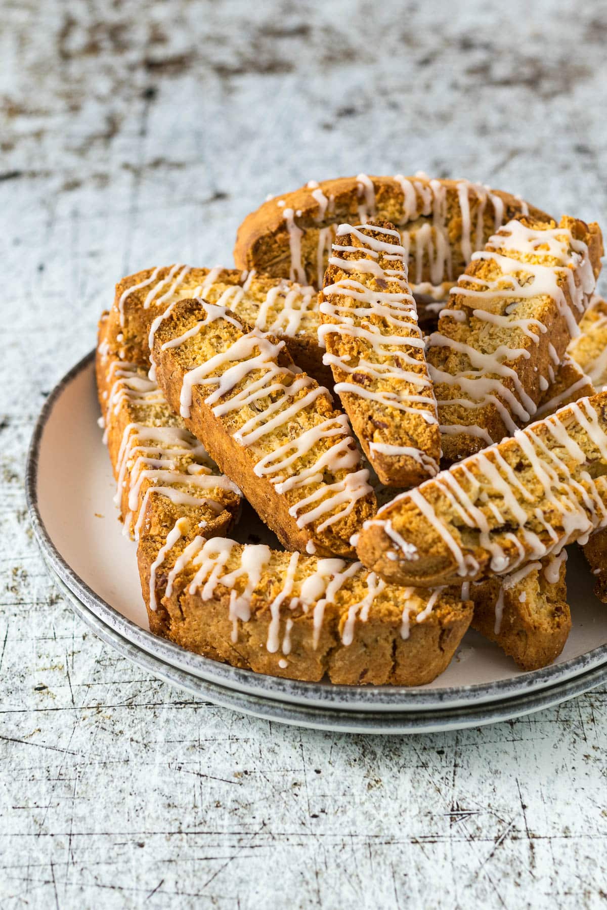 Biscotti piled on a plate.