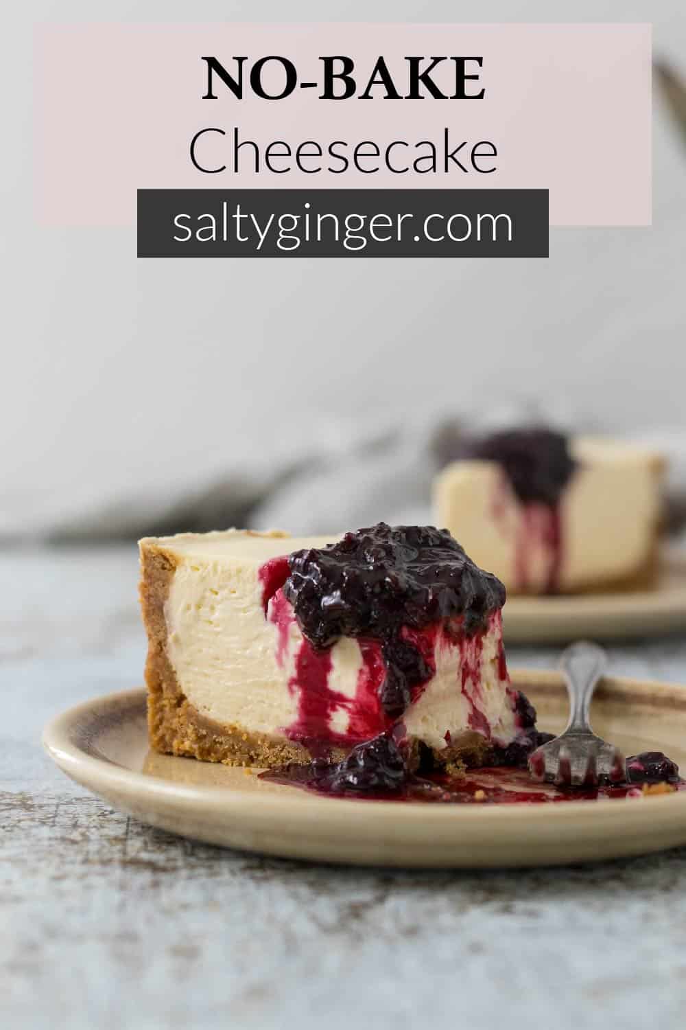 Pin - No-bake cheesecake on a plate with a berry compote.
