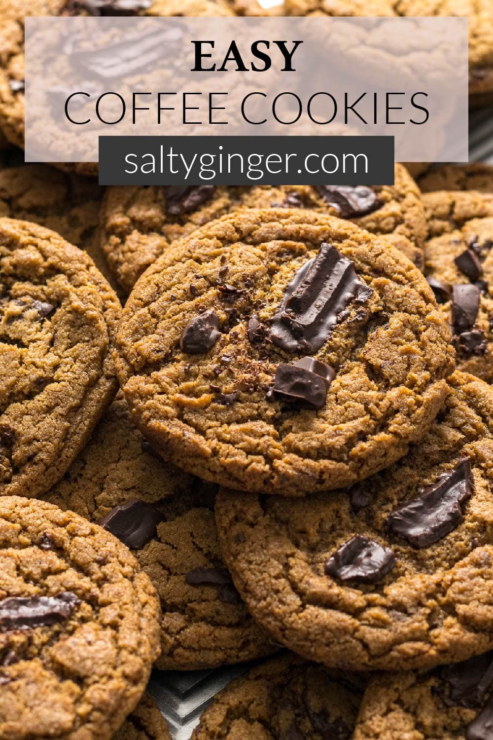 Pin - Chocolate chip coffee cookies on a baking sheet.