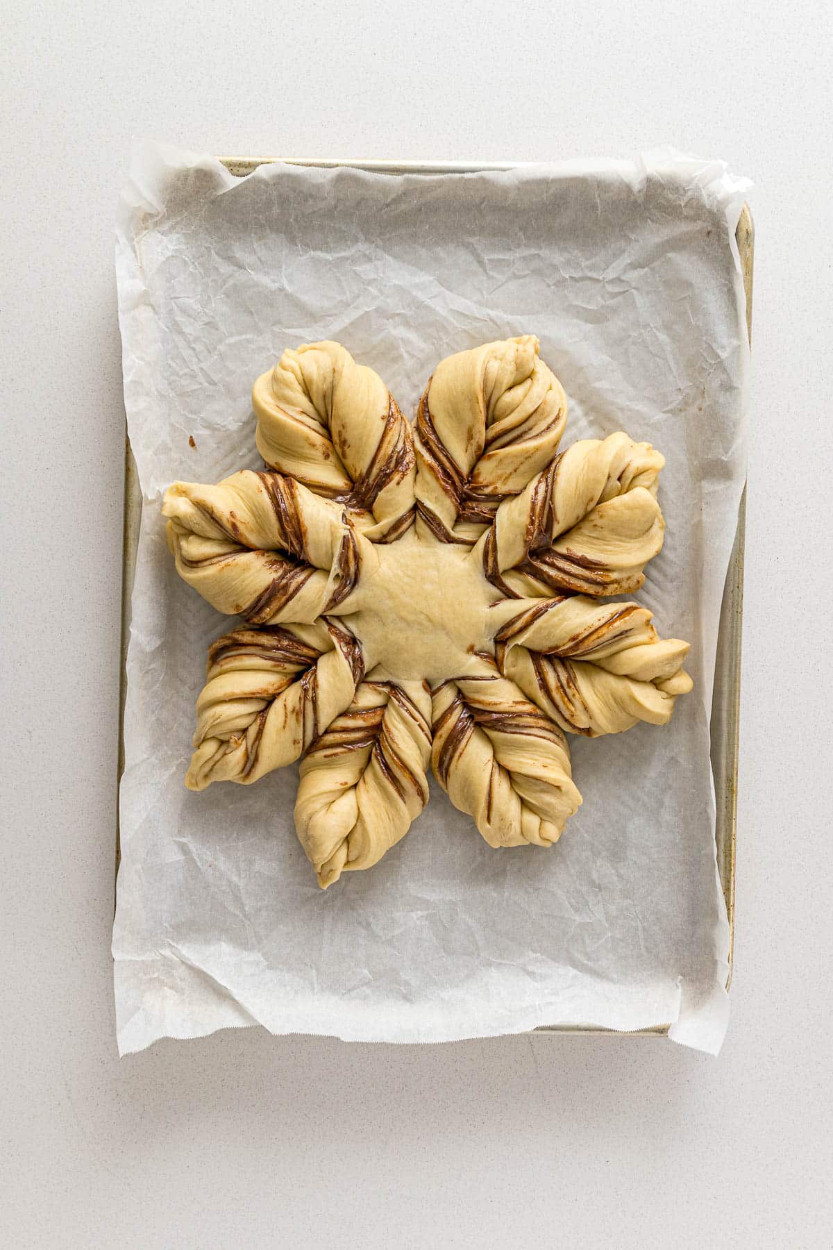 Nutella bread twisted to create the arms of the star.
