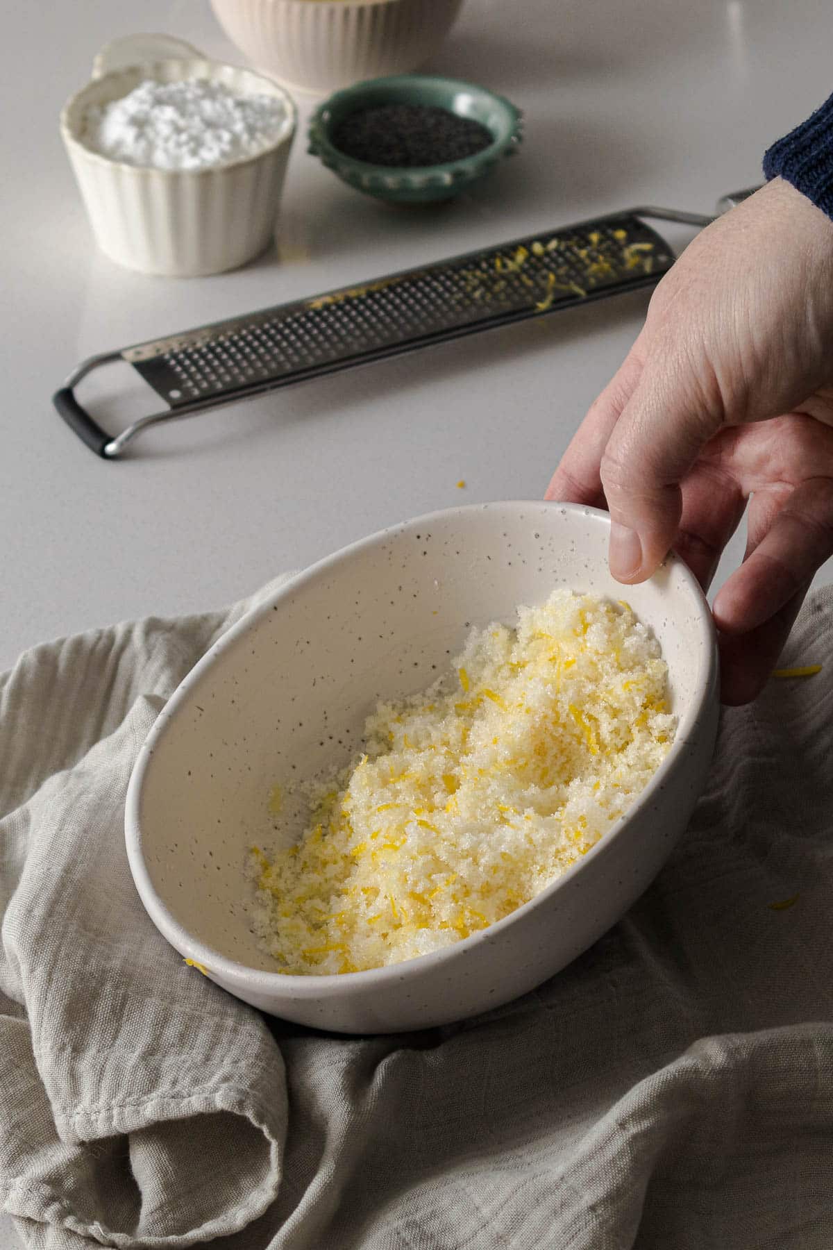 Step 3 - Lemon zest rubbed into the sugar in a small bowl.