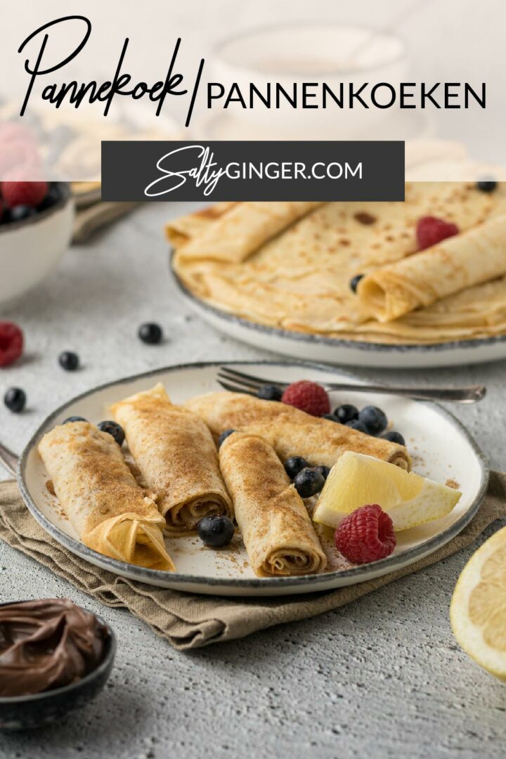 Pin - Pannekoek with cinnamon sugar on a plate with fresh berries.